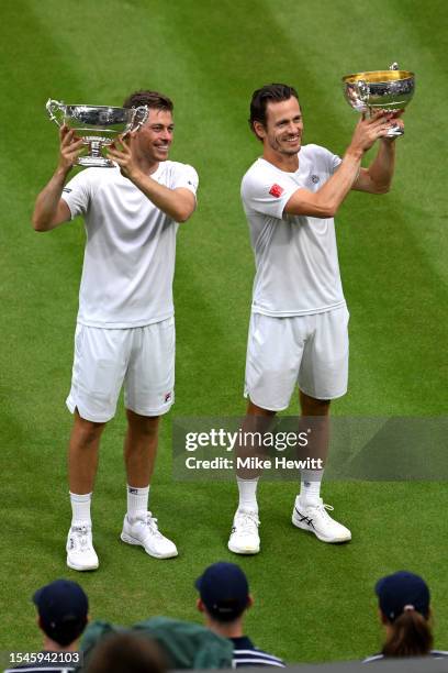 Neal Skupski and Wesley Koolhoof Great Britain lift the Men's Doubles Trophies following their victory in the Men's Doubles Finals against Marcel...