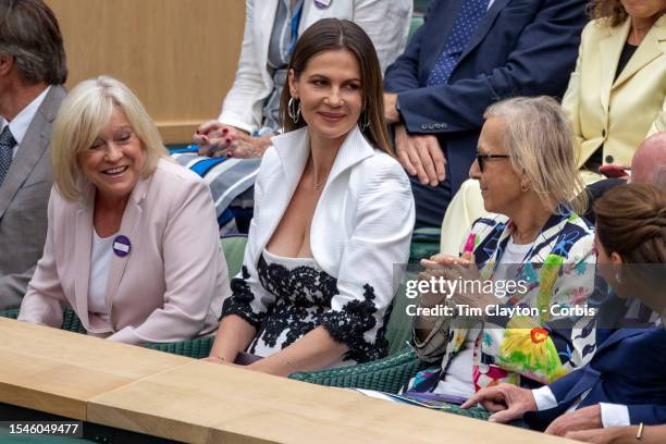 Sue Barker, Julia Lemigova and Martina Navratilova in the royal box at the Ladies' Singles Final match on Centre Court during the Wimbledon Lawn...