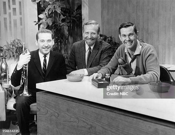 Pictured: Trumpet player Doc Severinsen, bandleader Skitch Henderson, host Johnny Carson --