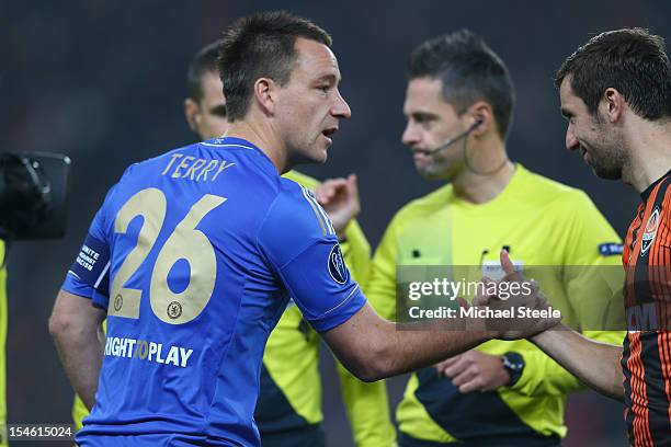 John Terry captain of Chelsea shakes hands with Darijo Srna captain of Shakhtar Donetsk during the UEFA Champions League Group E match between...