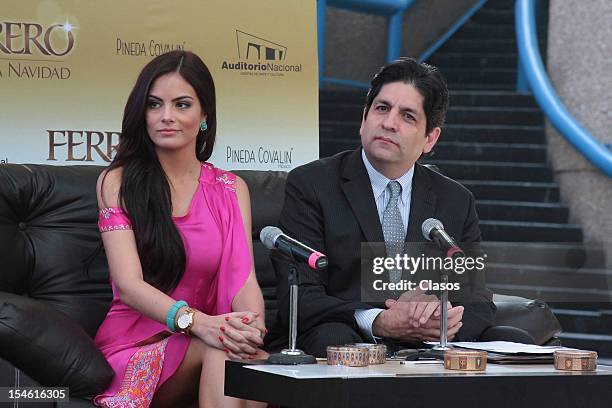 Ximena Navarrete and Luis Carlos Romo pose for a photo during the press conference of the installation of a Ferrero Rocher tree in the courtyard of...