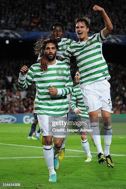 Giorgos Samaras of Celtic FC celebrates scoring with his teammates Mikael Lustig and Efe Ambrose during the UEFA Champions League group G match...