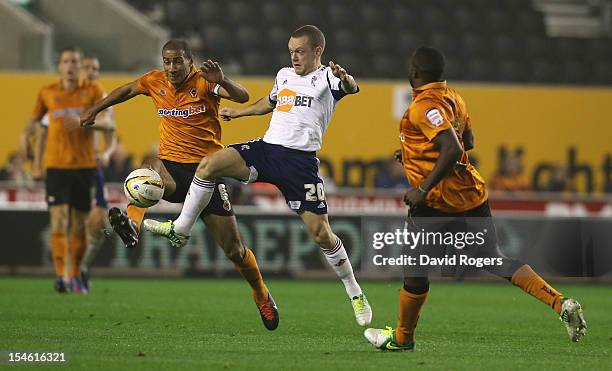 Karl Henry of Wolves challenges Jay Spearing during the npower Championship match between Wolverhampton Wanderers and Bolton Wanderers at Molineux on...