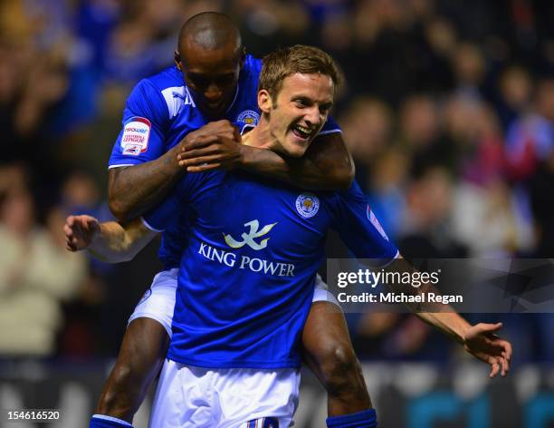 Andy King of Leicester celebrates scoring to make it 1-0 with team mate Lloyd Dyer during the nPower Championship match between Leicester City and...