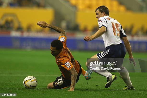 Jermaine Pennant of Wolves is tackled by Stephen Warnock during the npower Championship match between Wolverhampton Wanderers and Bolton Wanderers at...