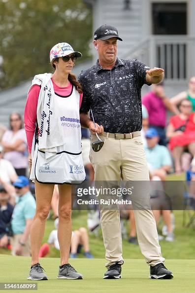 Stewart Cink of the United States talking with caddie and wife Lisa ...