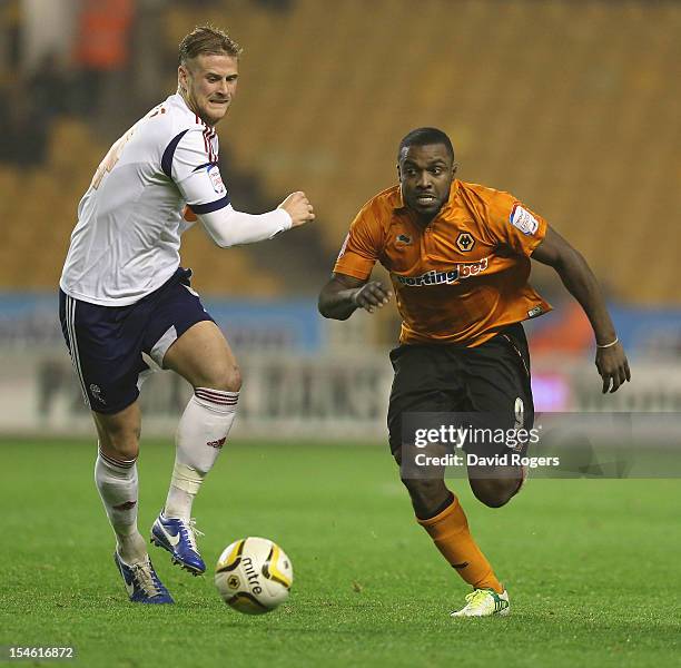 Sylvan Ebanks-Blake of Wolves moves past Matt Mills during the npower Championship match between Wolverhampton Wanderers and Bolton Wanderers at...