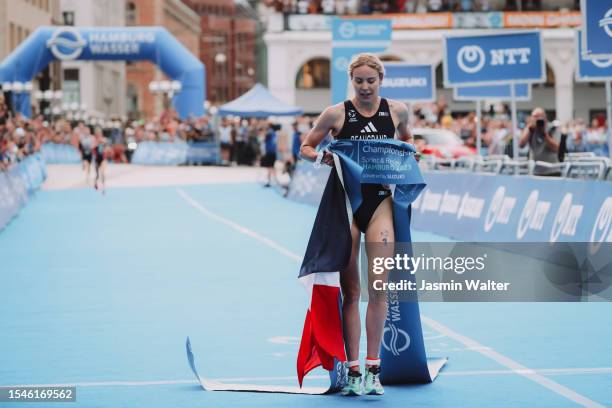 Cassandre Beaugrand of France reacts after winning the Women's Elite Sprint Race during the Hamburg Wasser World Triathlon on July 15, 2023 in...