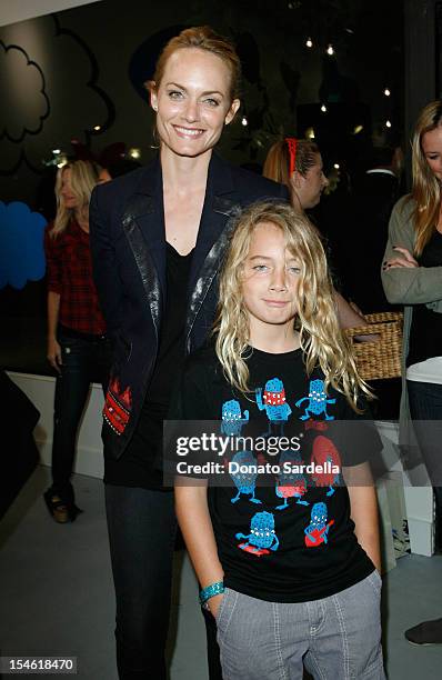 Amber Valletta and son Auden McCaw attend the Stella McCartney for GapKids Pop Up Store event on November 4, 2009 in Beverly Hills, California.