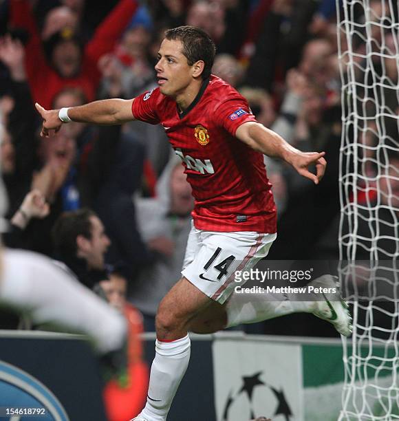 Javier "Chicharito" Hernandez of Manchester United celebrates scoring their third goal during the UEFA Champions League Group H match between...