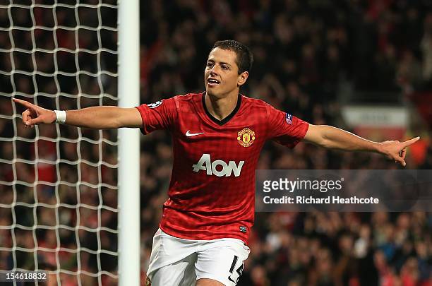 Javier Hernandez of Manchester United celebrates scoring his team's third goal to make the score 3-2 during the UEFA Champions League Group H match...