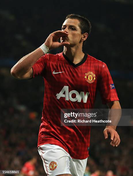 Javier Hernandez of Manchester United celebrates scoring his team's third goal to make the score 3-2 during the UEFA Champions League Group H match...