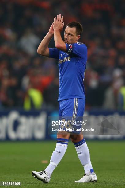 John Terry of Chelsea applauds the travelling supporters after his sides 1-2 defeat during the UEFA Champions League Group E match between Shakhtar...