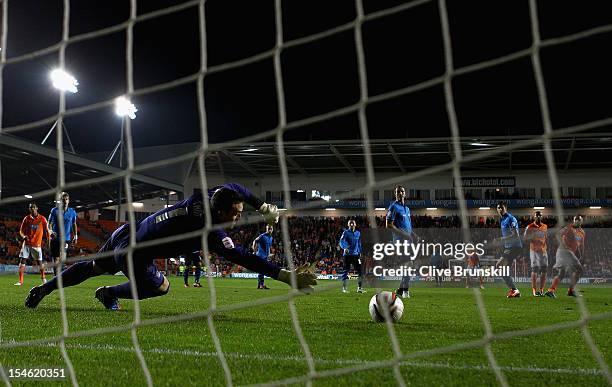 Gary Taylor-Fletcher of Blackpool score his teams second goal past Lee Camp of Nottingham Forest during the npower Championship match between...