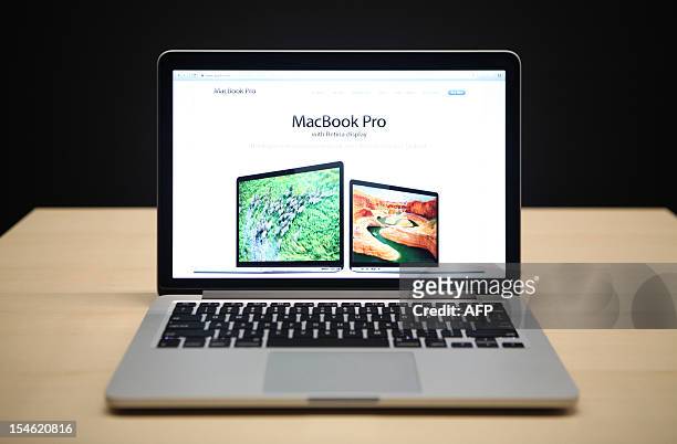 The new 13 inch Macbook Pro with a Retina display is seen during Apple's special event at the California Theatre in San Jose on October 23, 2012 in...