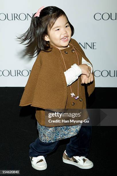 South Korean producer Joo Young-Hoon's daughter Joo A-Ra dances on as South Korean rapper Psy on the Promotional event of 'Couronne' Flagship Store...