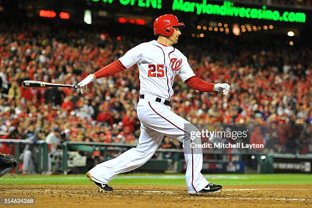 Adam LaRoche of the Washington Nationals takes a swing during Game Five of the National League Division Series against the St. Louis Cardinals at...