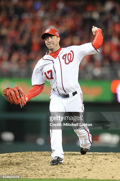 Sean Burnett of the Washington Nationals pitches during Game Five of the National League Division Series against the St. Louis Cardinals at Nationals...