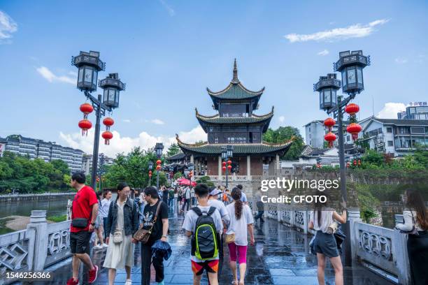 Tourists from all over China visit the historic Jiaxiu Pavilion in Guiyang, Guizhou Province, China, July 20, 2023.