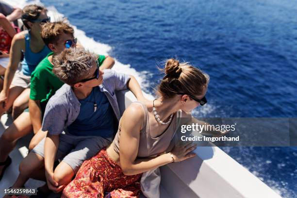 tourists travelling by ferry in liguria, italy - ferry stock pictures, royalty-free photos & images