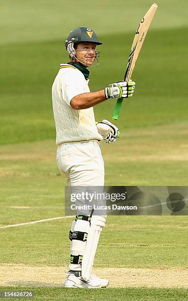 Ricky Ponting of the Tigers celebrates his 100th run during day two of the Sheffield Shield match between the Victorian Bushrangers and the Tasmanian...