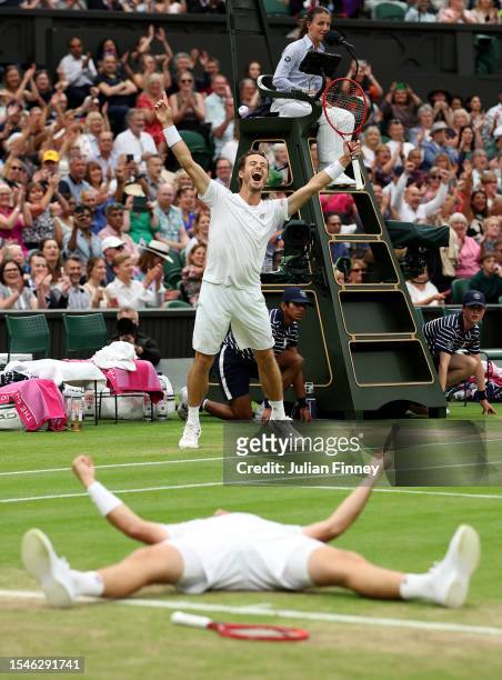 Neal Skupski of Great Britain and Wesley Koolhof of the Netherlands celebrate match point in the Men's Doubles Finals against Marcel Granollers of...