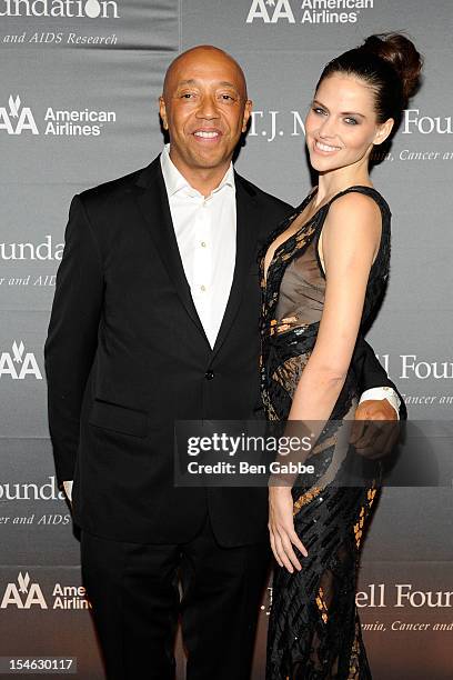 Russell Simmons and model Hana Nitsche attend The T.J. Martell Foundation 37th Annual Honors Gala at Cipriani 42nd Street on October 23, 2012 in New...