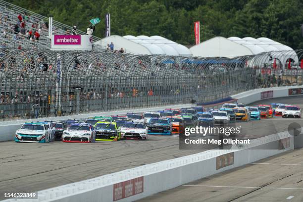 Chandler Smith, driver of the Quick Tie Products Inc. Chevrolet, and John Hunter Nemechek, driver of the Persil Toyota, lead the field to the green...