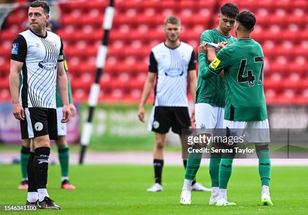 Lewis Miley of Newcastle United receives the captains armband from brother Jamie Miley during the Pre Season Friendly between Gateshead FC and...