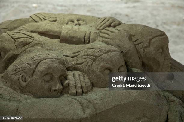 Sculpture made at the Sand Sculpture Festival on one of the shores of the Caspian Sea in Babolsar city, north of Tehran, on July 23, 2013 in...