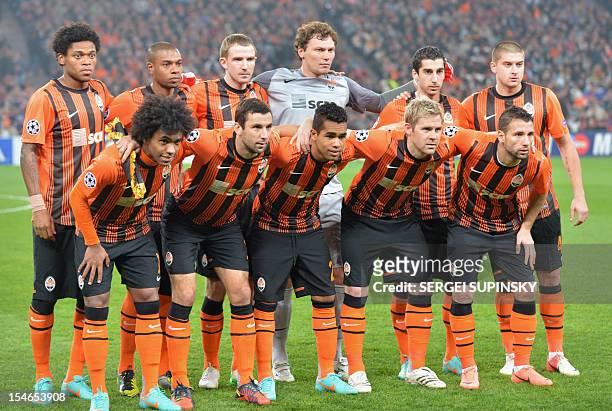Shakhtar players, back row, from left, forward Luiz Adriano, midfielder Fernandinho, defender Olexandr Kucher, goalkeeper Andriy Pyatov, midfielder...