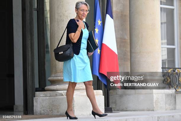 French Prime Minister Elisabeth Borne leaves after a cabinet meeting at the Elysee Palace in Paris on July 21, 2023. French presidency formalized...