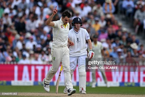 Australia's Pat Cummins celebrates after bowling England's captain Ben Stokes on day three of the fourth Ashes cricket Test match between England and...