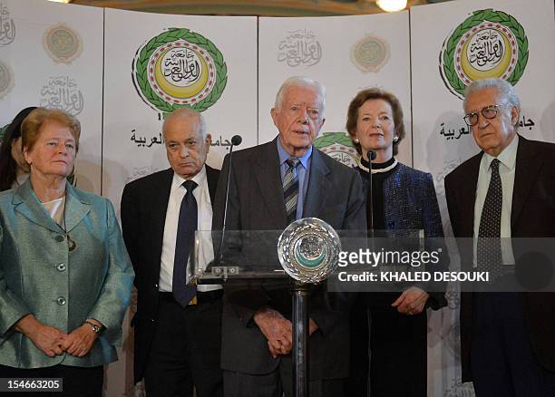 Former US president Jimmy Carter addresses a joint press conference with Arab League chief Nabil al-Arabi , former president of Ireland Mary Robinson...