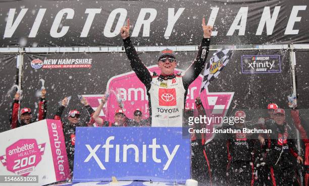 John Hunter Nemechek, driver of the Persil Toyota, celebrates in victory lane after winning the NASCAR Xfinity Series Ambetter Health 200 at New...