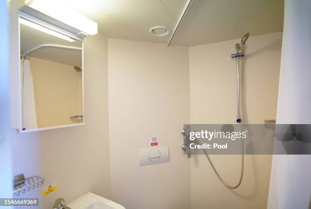 View of the en-suite bathroom inside one of the bedrooms onboard the Bibby Stockholm accommodation barge at Portland Port on July 21, 2023 in...