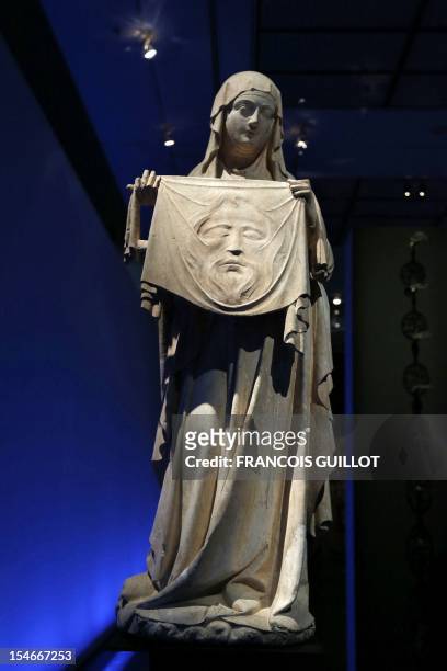 Picture taken on October 24, 2012 at the Petit Palais in Paris, shows a 14th century stoned Sainte-Veronique, shown during the exhibition "Dieux,...