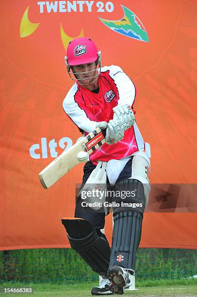 Peter Nevill pulls a delivery in the nets during a Sydney Sixers training session at Bidvest Wanderers Stadium on October 24, 2012 in Johannesburg,...