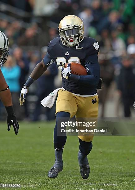 Cierre Wood of the Notre Dame Fighting Irish runs against the BYU Cougars at Notre Dame Stadium on October 20, 2012 in South Bend, Indiana. Notre...