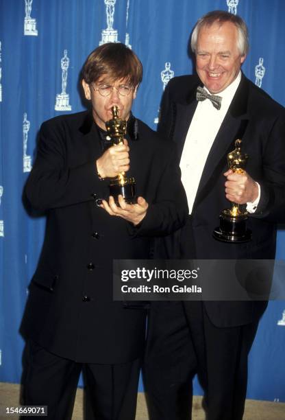 Musician Elton John and lyricist Tim Rice attend the 67th Annual Academy Awards on March 27, 1995 at Shrine Auditorium in Los Angeles, California.