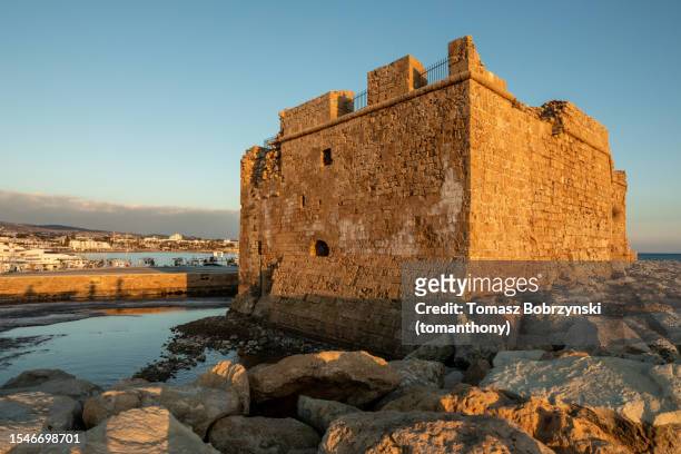 majestic paphos castle: a timeless fortress by the sea - paphos stock pictures, royalty-free photos & images