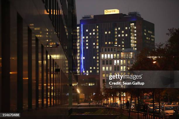 The main building of Charite hospital stands at twilight as Charite officials continue their investigation into the death of an early-born infant...