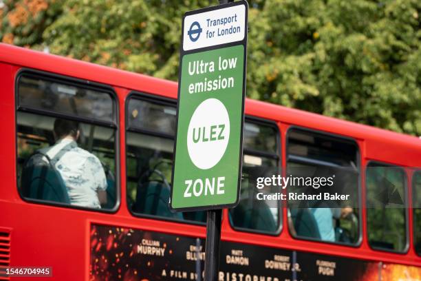 Local bus passes an ULEZ sign on the South Circular at Tulse Hill, on 21st July 2023, in London, England. Introduced by his Conservative predecessor...