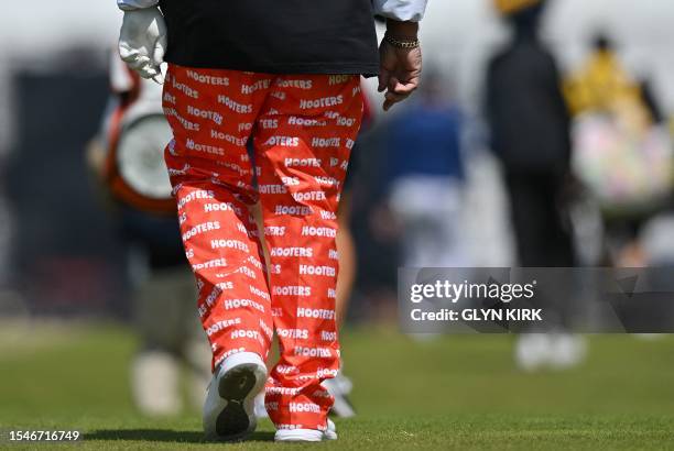 Golfer John Daly walks on the 13th green on day two of the 151st British Open Golf Championship at Royal Liverpool Golf Course in Hoylake, north west...