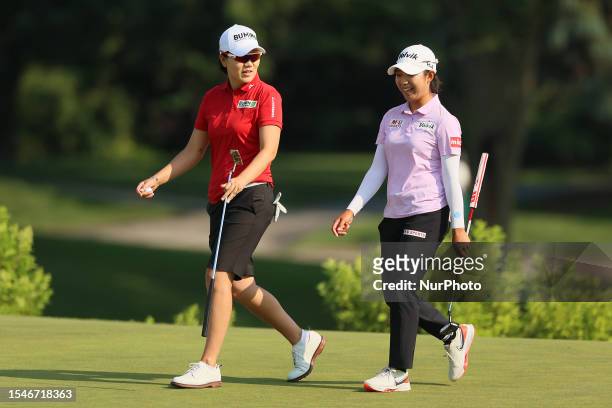 Mi Hyang Lee of Seoul, Republic of Korea, and Jeongeun Lee5 of Seoul, Republic of Korea walk on the third green during the second round of the Dow...