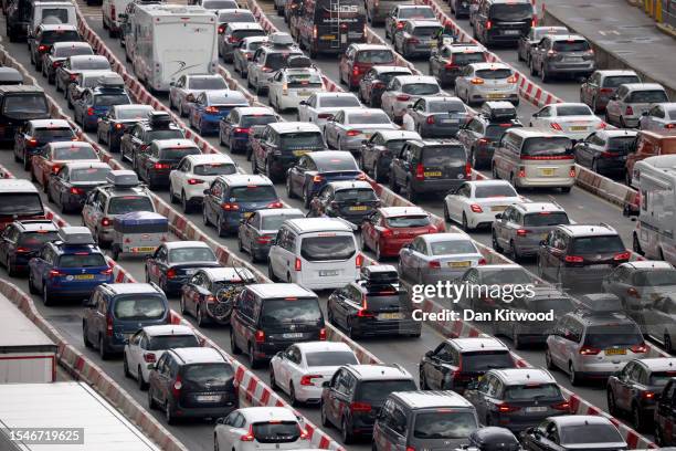 Queues of lorries and cars move steadily at the Port of Dover as the busy summer travel period begins on July 21, 2023 in Dover, England....