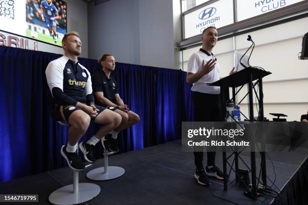 Scott McNeil, Coach Developer with EPL introduces Ed Brand, U18 Head Coach and Sam Page, head of the academy of Chelsea FC during a a coaching clinic...
