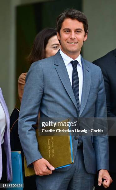 Newly appointed Education Minister Gabriel Attal and newly appointed Minister for Health and Prevention Aurelien Rousseau leave after a cabinet...