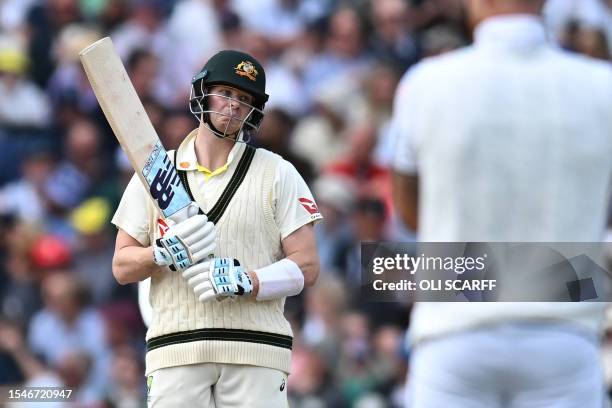 Australia's Steven Smith gestures while batting on day three of the fourth Ashes cricket Test match between England and Australia at Old Trafford...