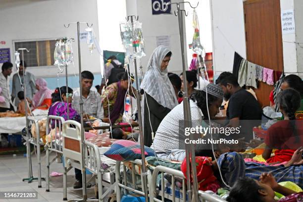 Patients suffering from dengue fever are being treated inside the Mugdha General Hospital's admission section in Dhaka, Bangladesh on July 21, 2023....